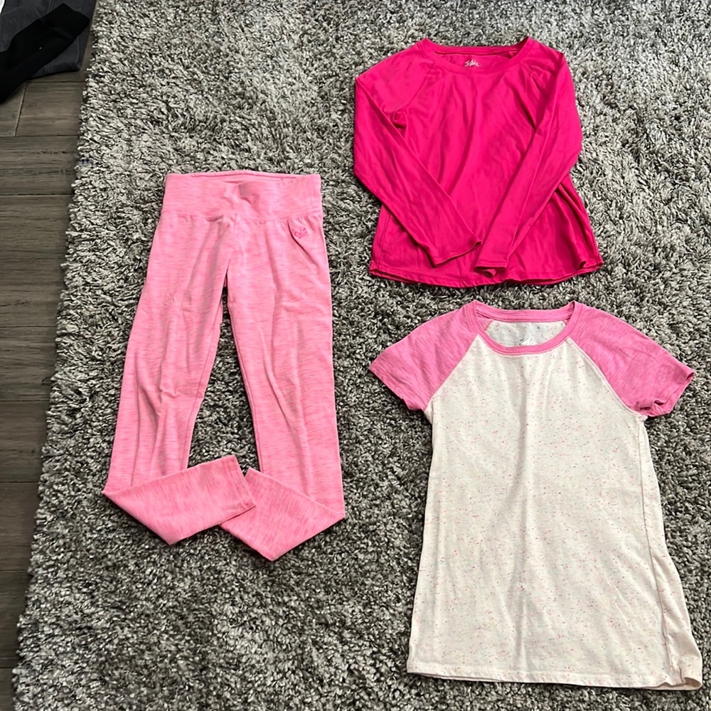2 shirts and a pair of leggings